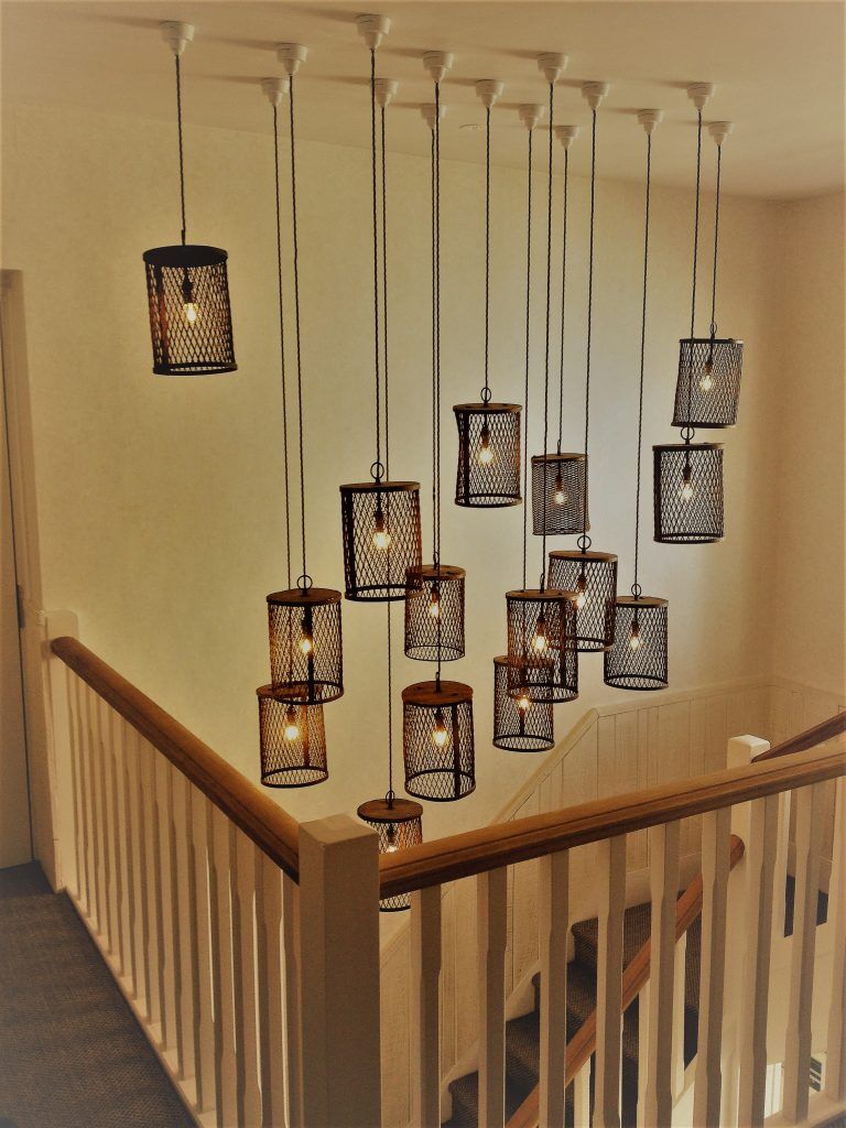 Feature pendant lighting over a stairwell