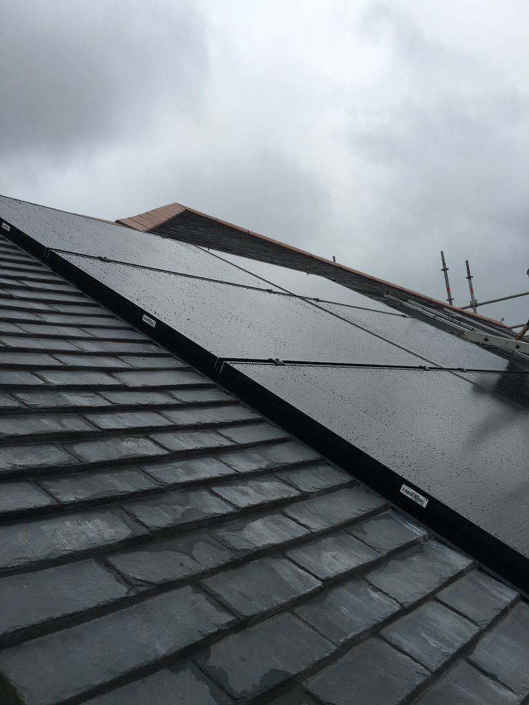 Black solar panels on a roof